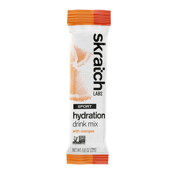 Skratch Labs hydration drink mix packet with orange flavor on a white background